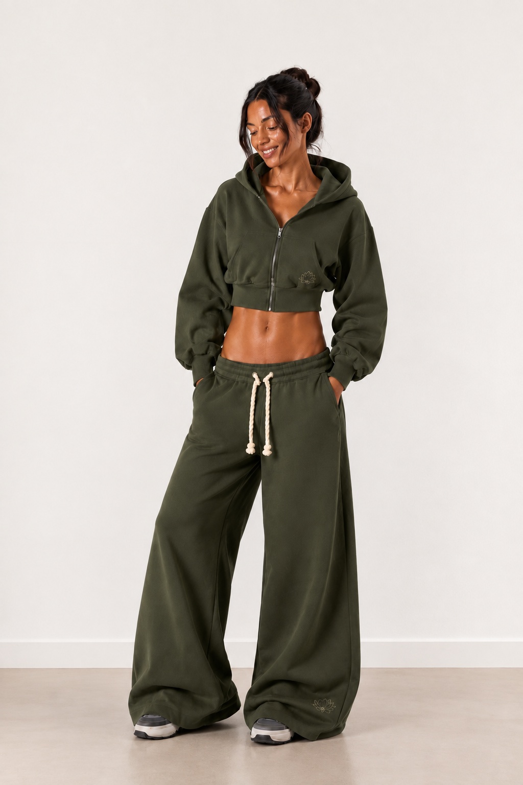 Full-length view of the Lotus Original Green cropped zip-up hoodie worn with the matching wide-leg tracksuit bottoms.